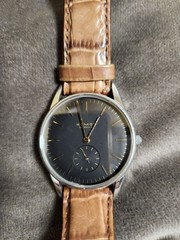 NOMOS GLASHÜTTE Orion 35mm rare black dial with gold lettering brown belt