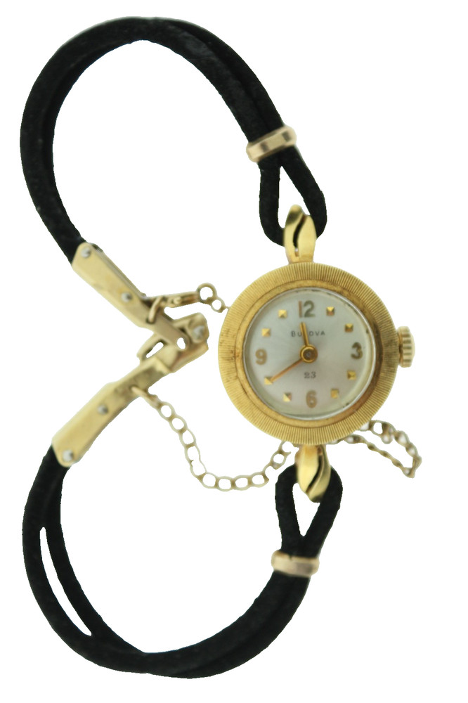 18K gold BULOVA M7 ladies wrist watch on silk cord.