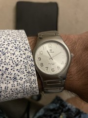 Cyma Watch with titanium case and Integrated bracelet, lume and silver Dial