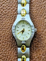 Q&Q (by Citizen) Women’s Watch Two Tone Silver With Gold Accents Bracelet